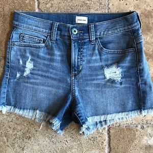 Distressed high-rise cutoff shorts